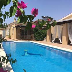 Horario de apertura Casa Natalie, Chiclana de la Frontera